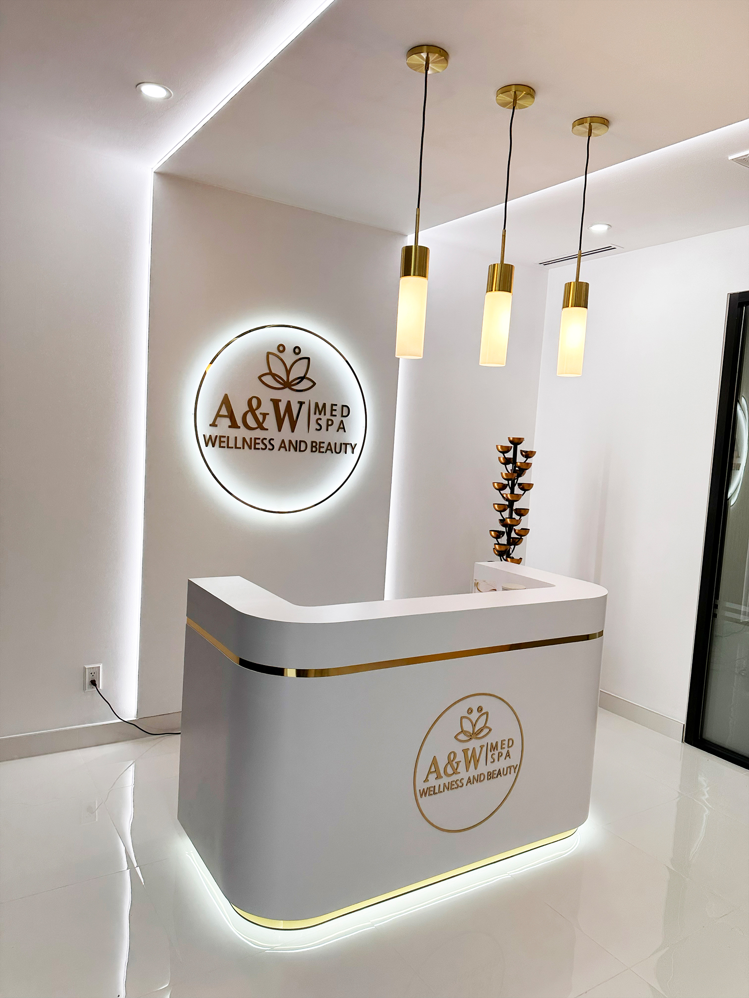 Completed reception desk and illuminated sign